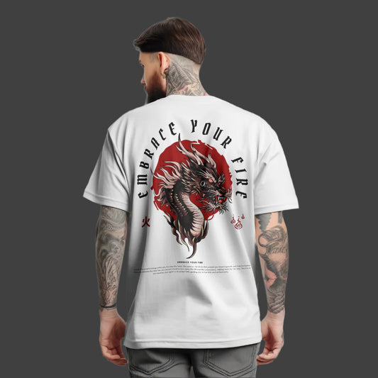 Man wearing a white t-shirt with a dragon design and text on the back, standing against a plain background.