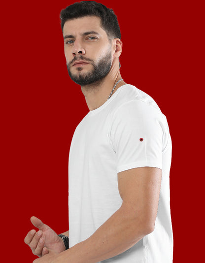Man wearing a white t-shirt with a red background