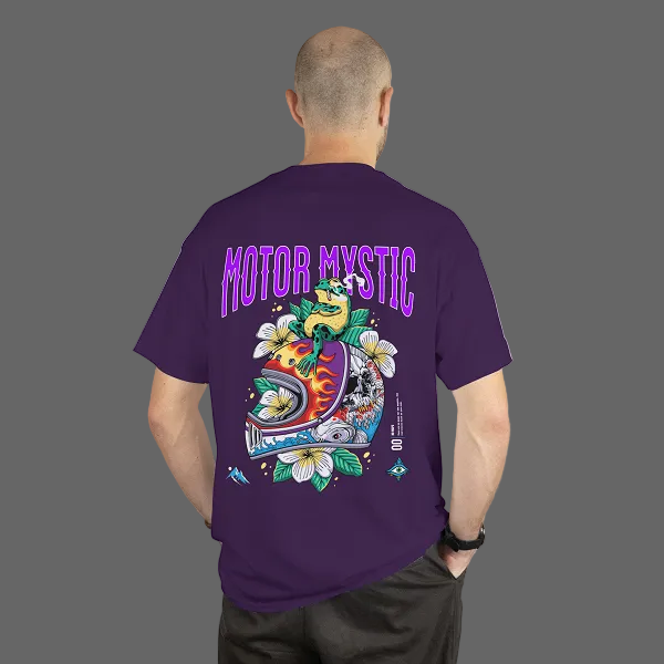 Person wearing a purple t-shirt with 'Motor Mystic' design on the back against a gray background